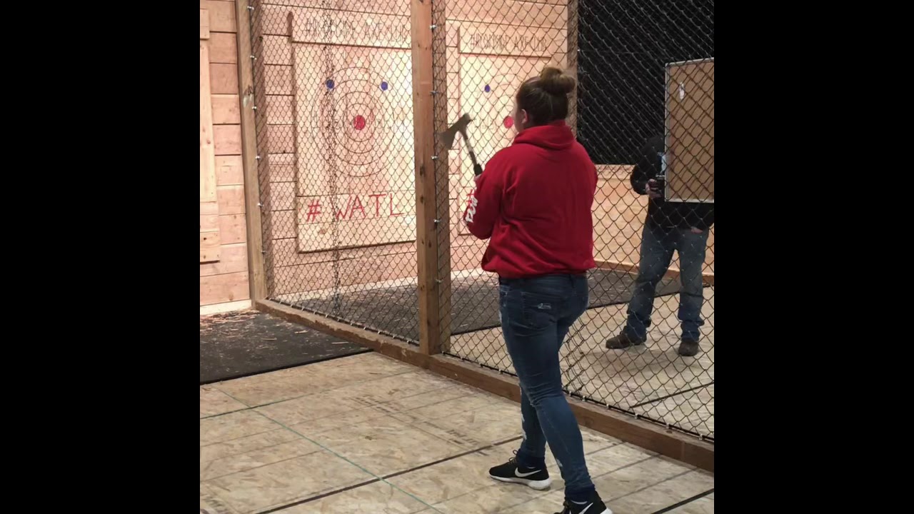 Girl Scouts axe throwing