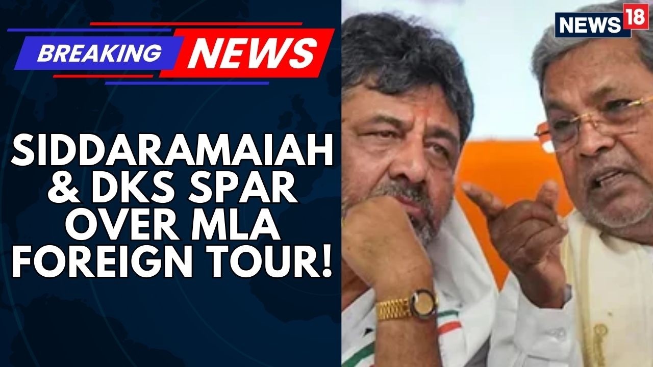 Junket Amid Crisis? 14 Karnataka MLAs’ Foreign Trip Sparks Public Outrage | Siddaramaiah | News18
