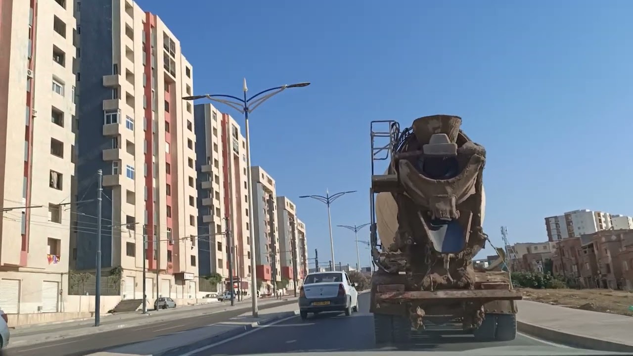 Mostaganem, El Hadj El Hachemi Guerrouabi Allah Yarhmou. Une balade d'été sur la côte de Mosta.