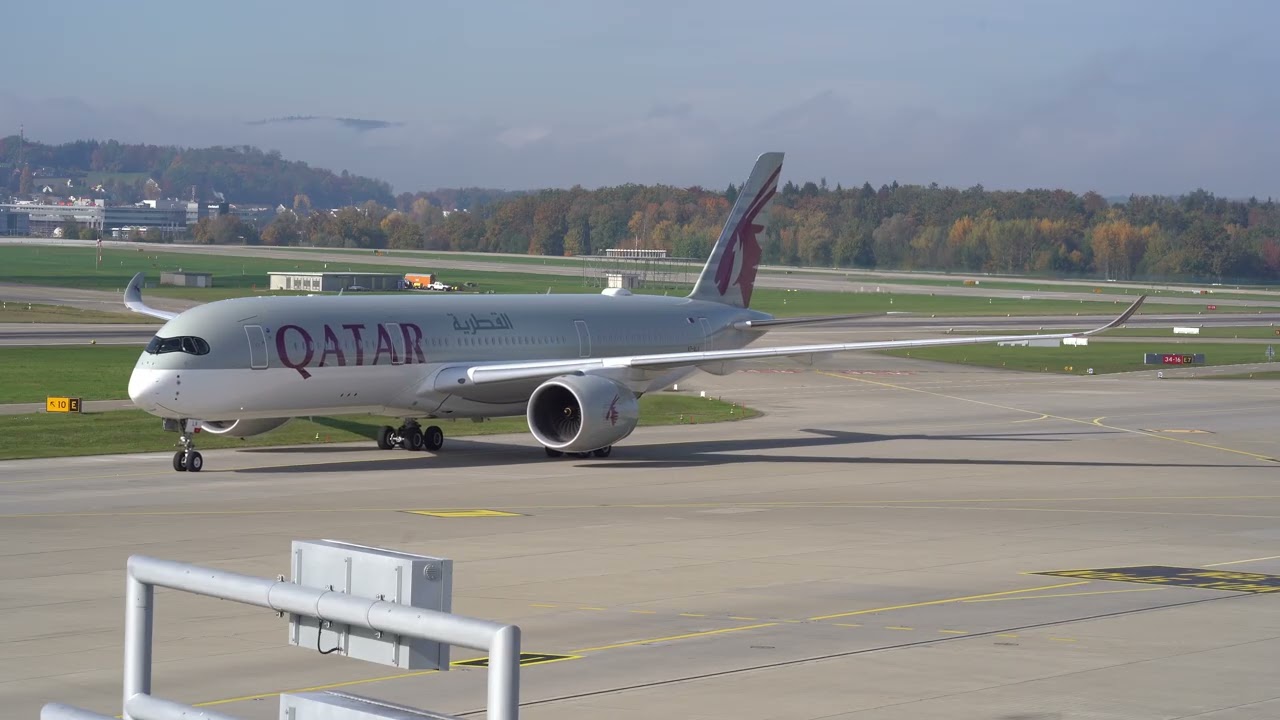 Zurich Airport Qatar Airways airplane Airbus A350-941 A7-ALV taxiing to gate.
