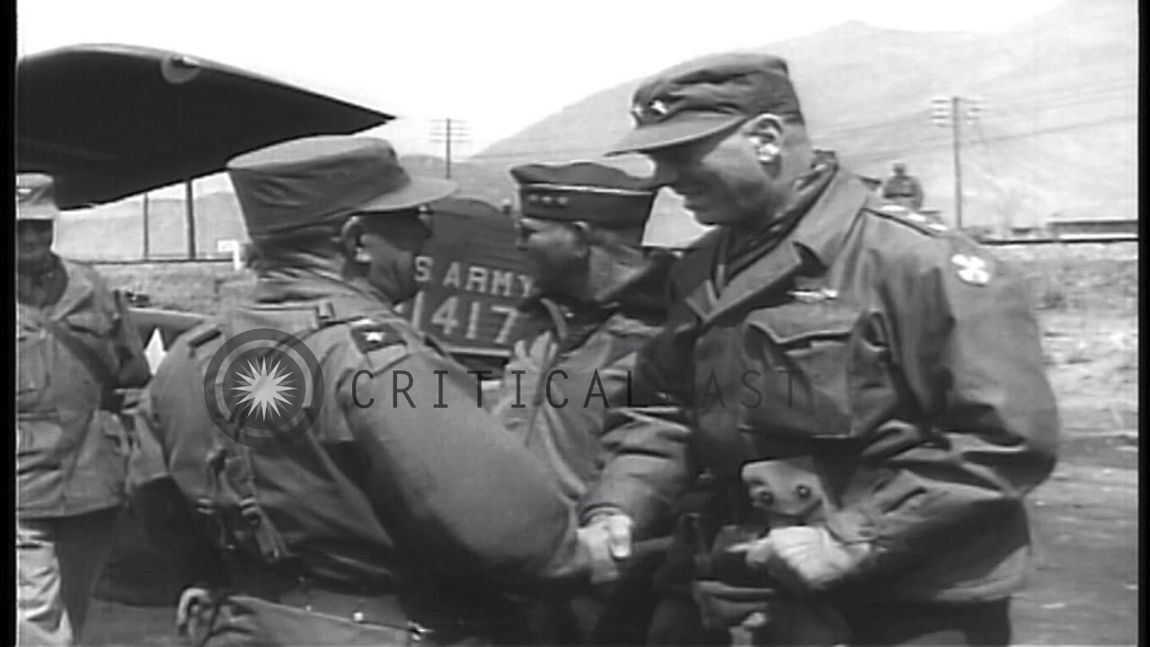 United States soldiers advance on the battlefield and Korean refugees evacuate an...HD Stock Footage