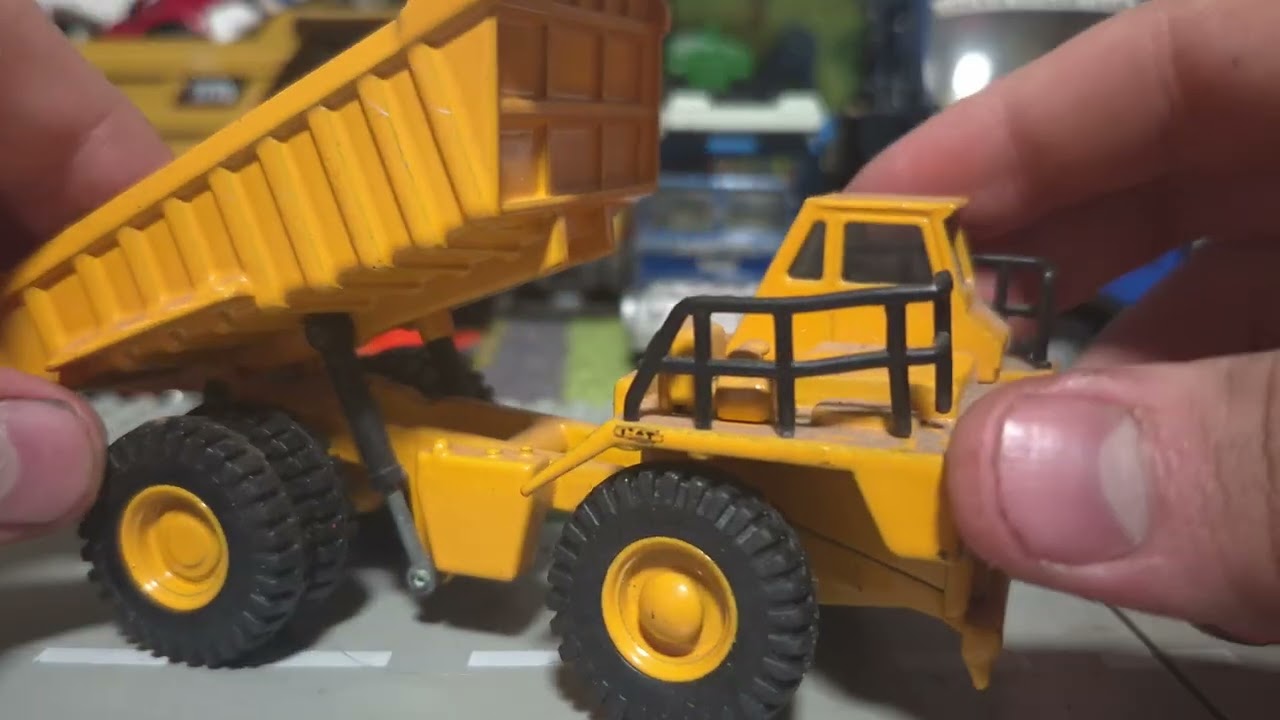 Going through a bin of cars 