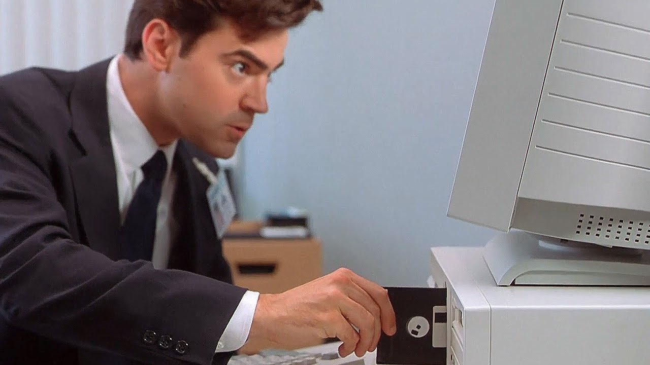 Planting the virus and checking the bank account balance &ndash; Office Space (1999)