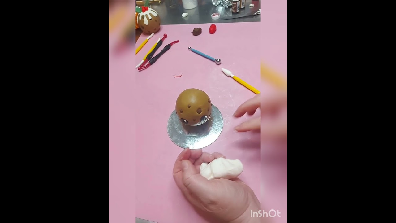 Terry's Chocolate Orange Decorating. A smiley Christmas Pudding. :)