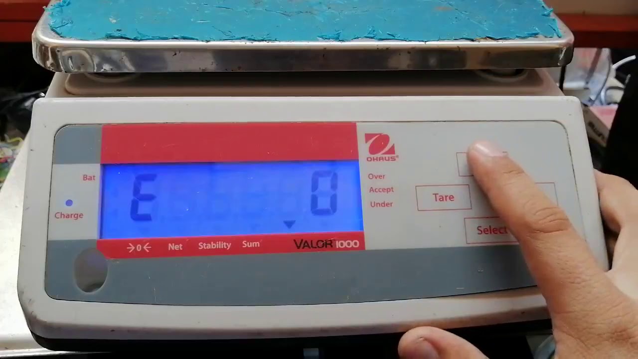 Ajuste de peso (calibracion) bascula Ohaus modelo V11P15 series Valor 1000