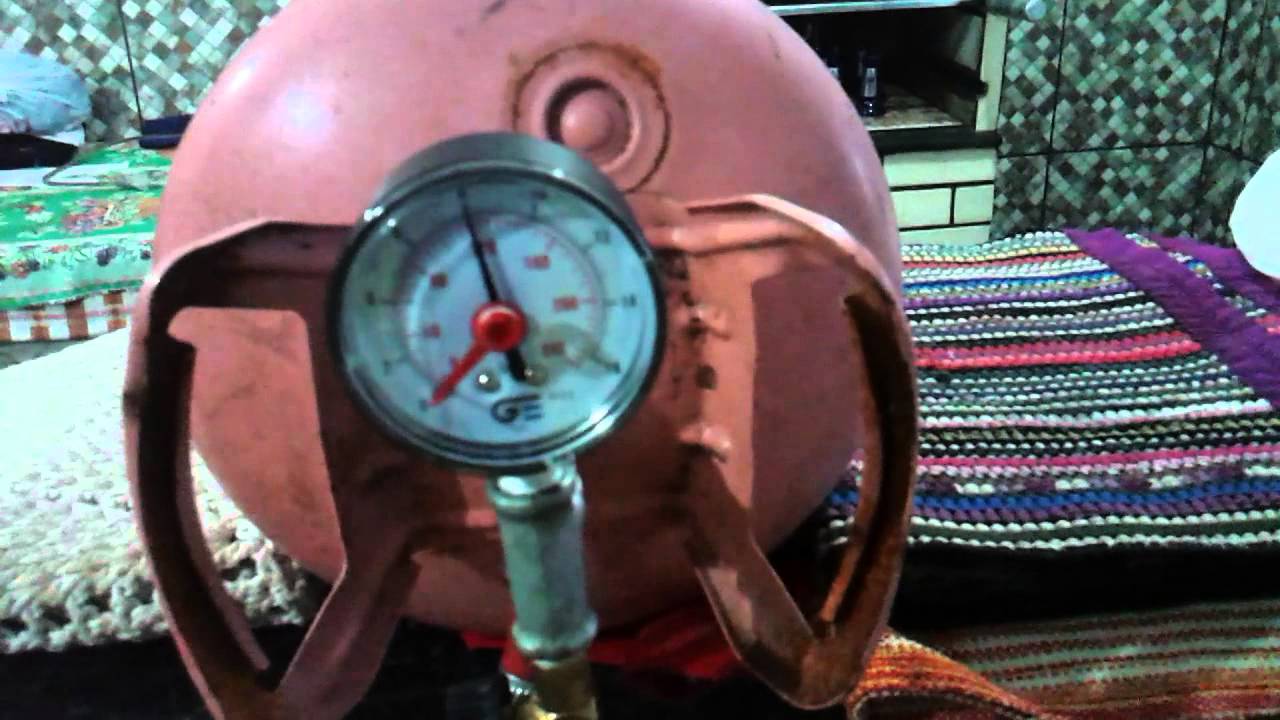 Compressor caseiro com 120 libras dentro do botijao de gás para refrigeração.