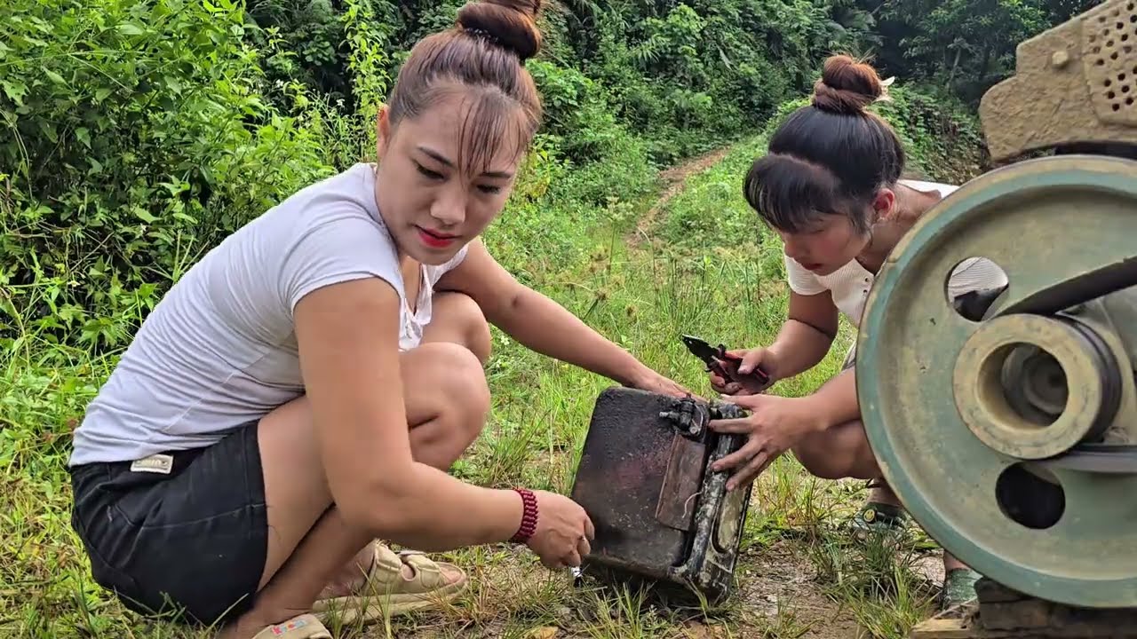 talented girl: repair big tractor change oil filter for machine
