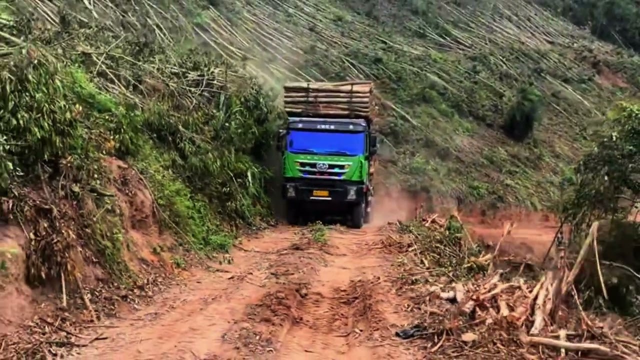 What should I do if the car tilts its head while pulling wood uphill?