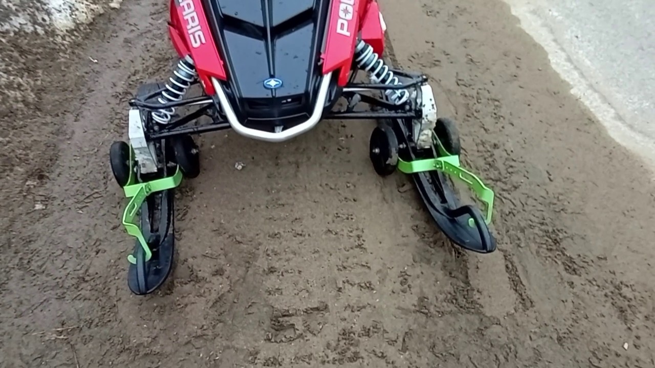 Kastforce snowmobile ski wheels on county roads via Polaris Indy 550. AH, Ontario.