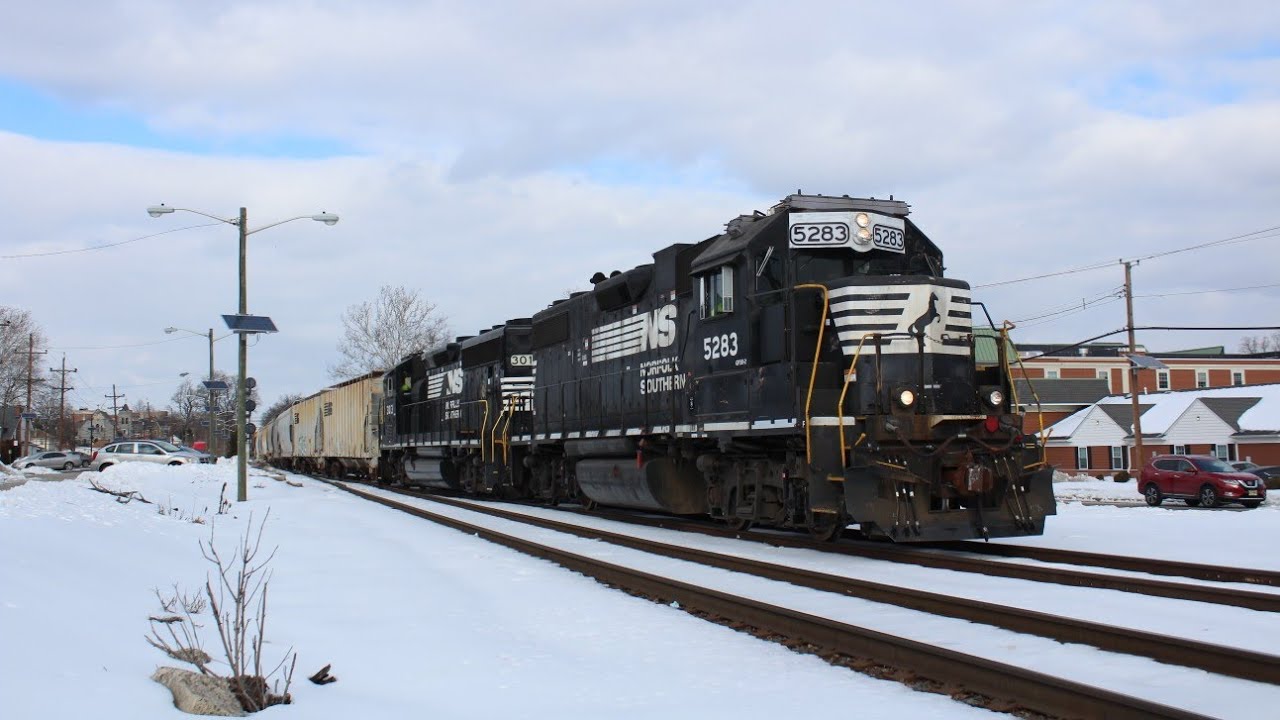 MI-21 & CA-11 on 2/12/26 - Thoroughbred paint NS GP38-2 5283 with RS3L leads MI-21