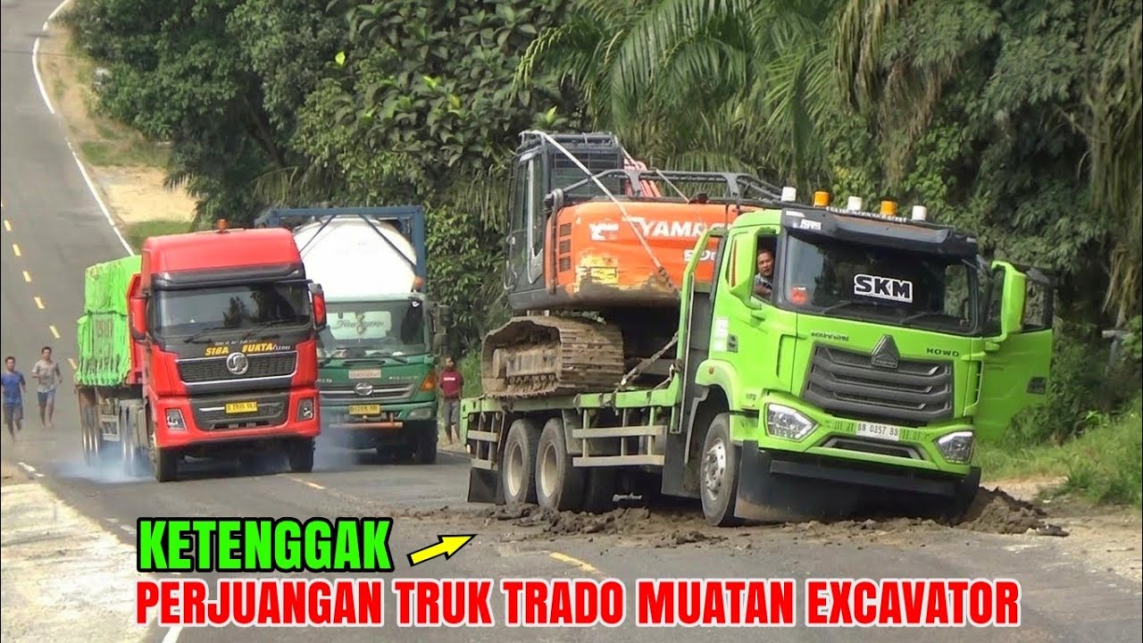 TRUK TRADO HOWO MUATAN EXCAVATOR KETENGGAK 