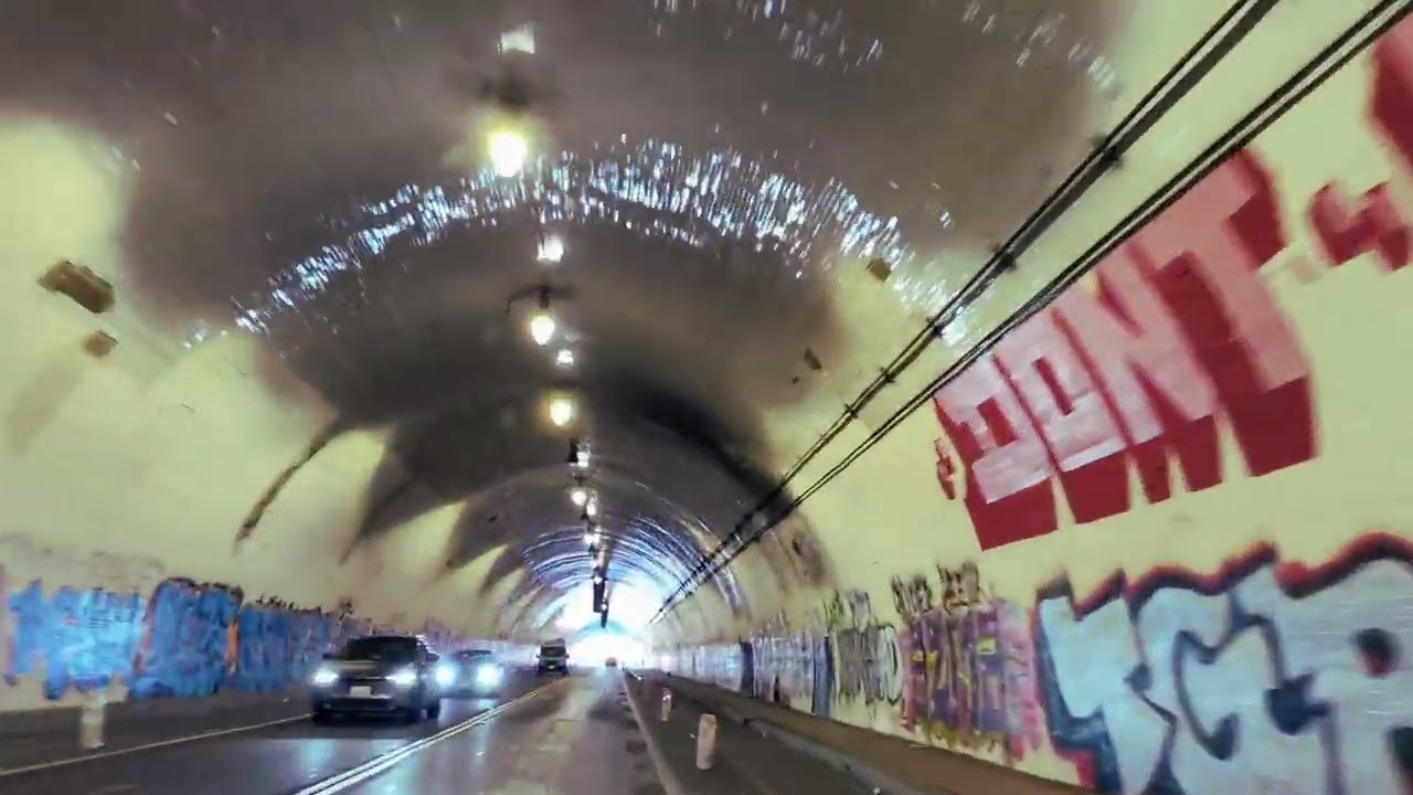 The state of the Second Street Tunnel, the glazed tiles putting on a show in spite of the city.