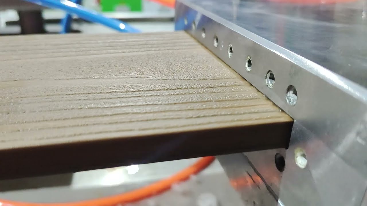 WPC decking making machine with co extrusion and 3D embossing online automatical made by Yongte