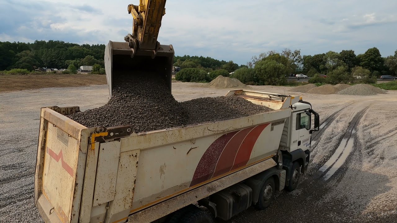 Загрузка экскаватора Sumitomo
