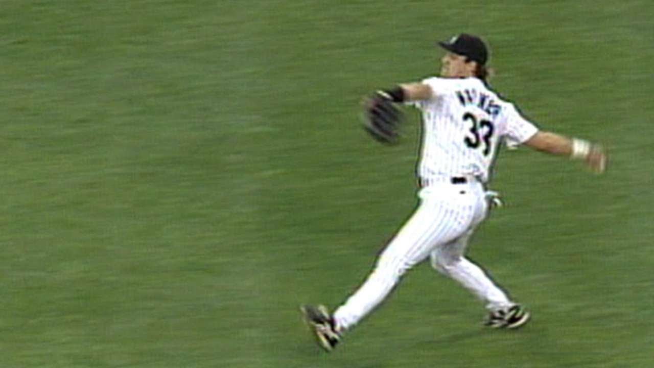 Larry Walker throws out Hal Morris at the dish
