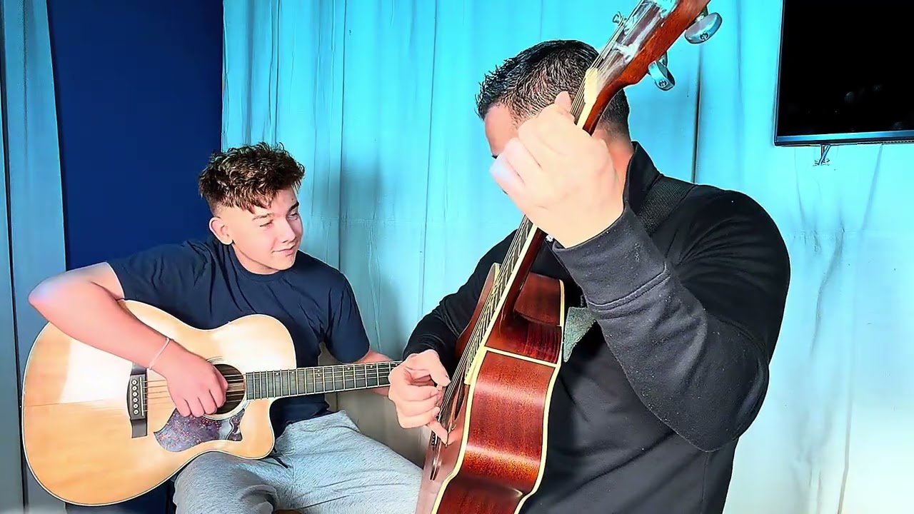 Playing guitar with my son