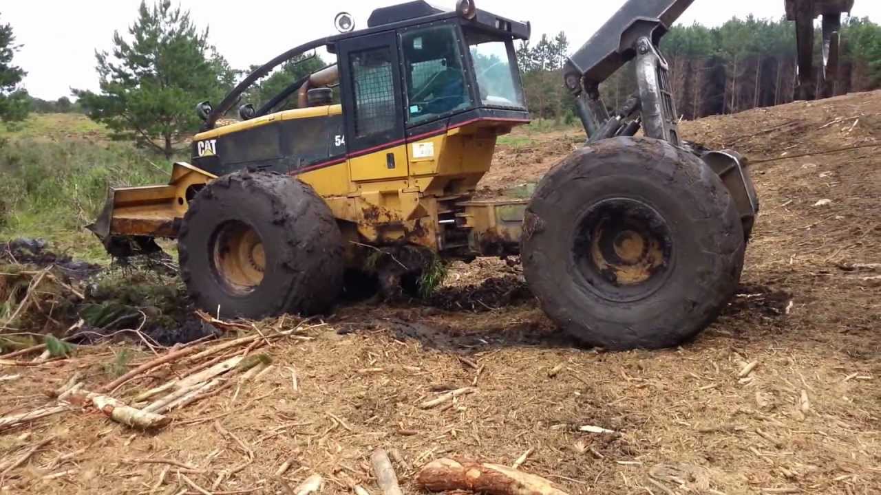 Desencalhando Skidder cat 545
