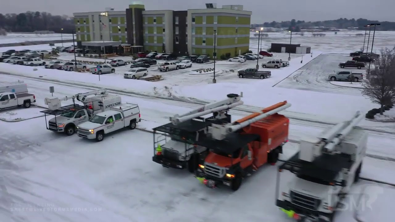 02-18-2021 Monroe, LA - Ice Storm, Power Poles Down, Line Workers Staging, Trees Iced Over, drone