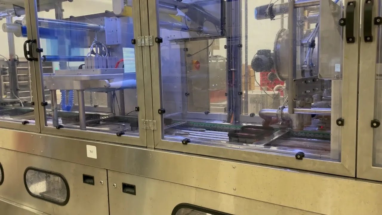 TAVA DOLUM VE KAPAMA MAKİNESİ-PAN FILLING AND SEALING MACHINE