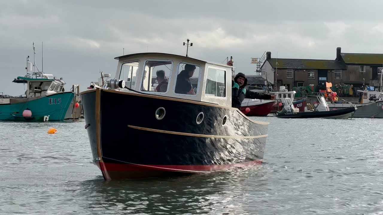 The exciting launch of a new student built boat at the Lyme Regis Boatbuilding Academy.