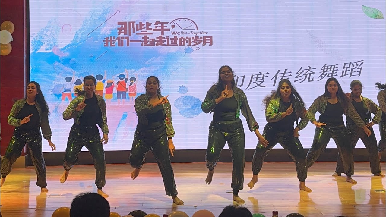 Indian girls performing energetic dance