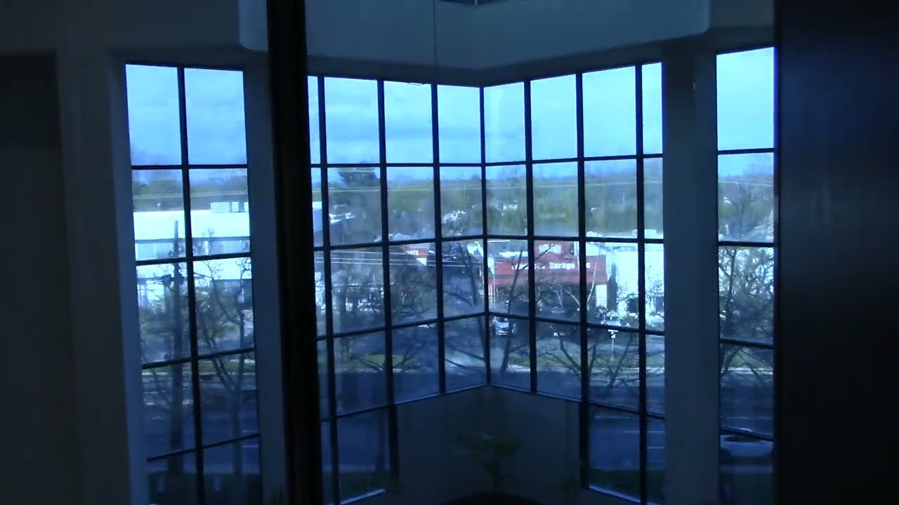 Modernized OTIS Traction (Glass) Elevators - Woodmont Office Center - Rockville, MD | ECFE
