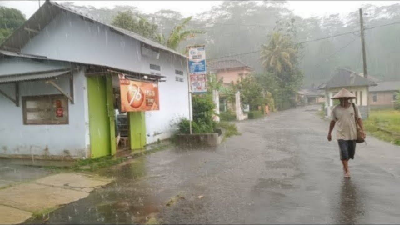 RAIN AND THUNDERSTORM WITH BEAUTIFULL LANSCAPE INDONESIAN VILLAGE