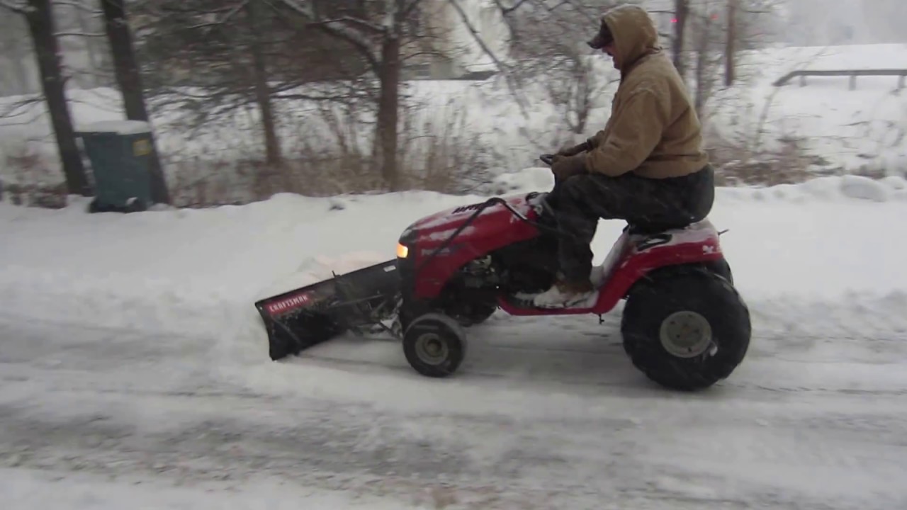 Plowing snow with lawn tractor WITHOUT TIRE CHAINS using 22in. atv tires.