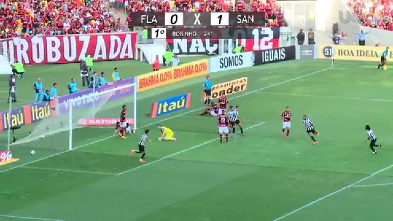 Robinho chuta cruzado, por baixo do goleiro e abre placar para o Santos