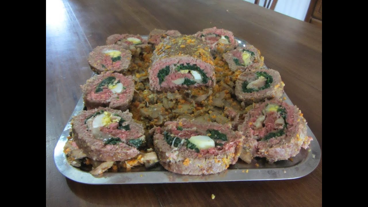 Polpettone con spinaci e contorno di funghi