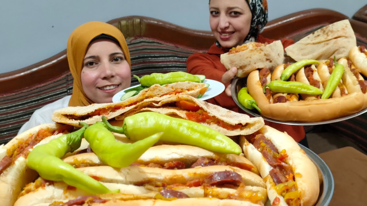 تحدي اكل سرعه المدخن 18 ساندوتش سجق 🌭 مدخن 🌮بين امال وشيماء والعقاب للاسف في الشارع🚘🚔