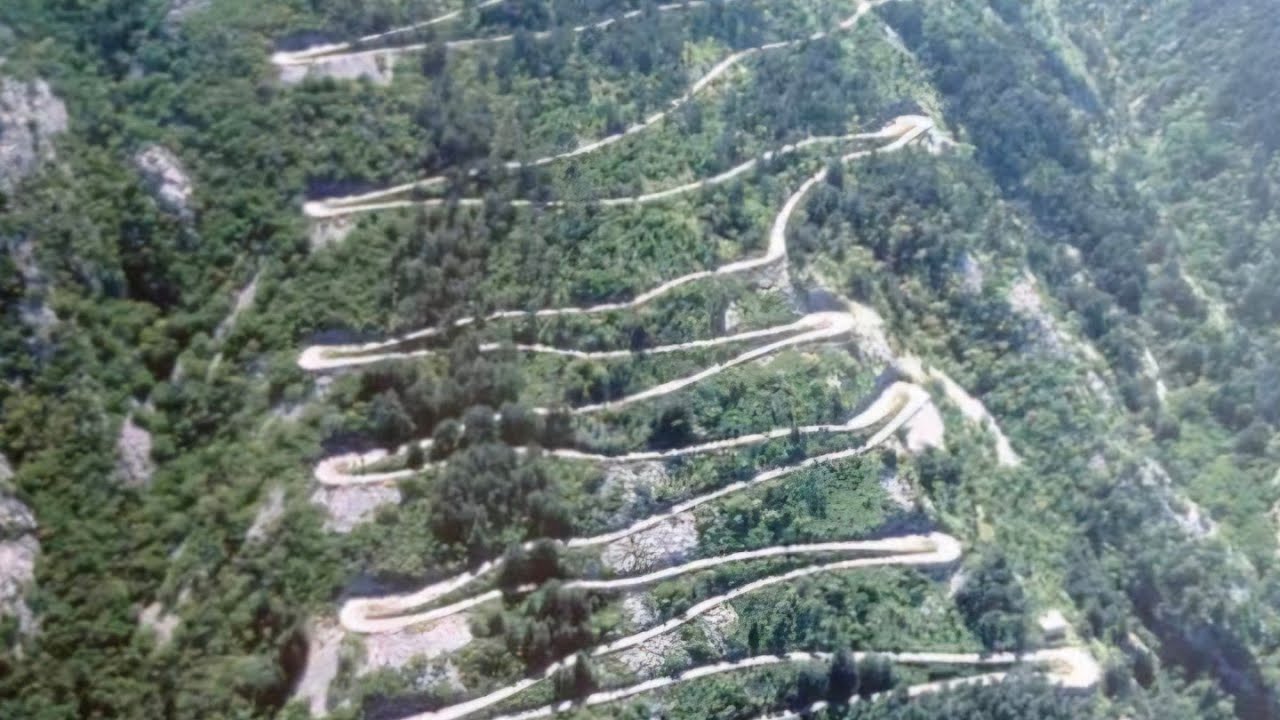 driving in montenegro (serpentine road going to lovcen national park)