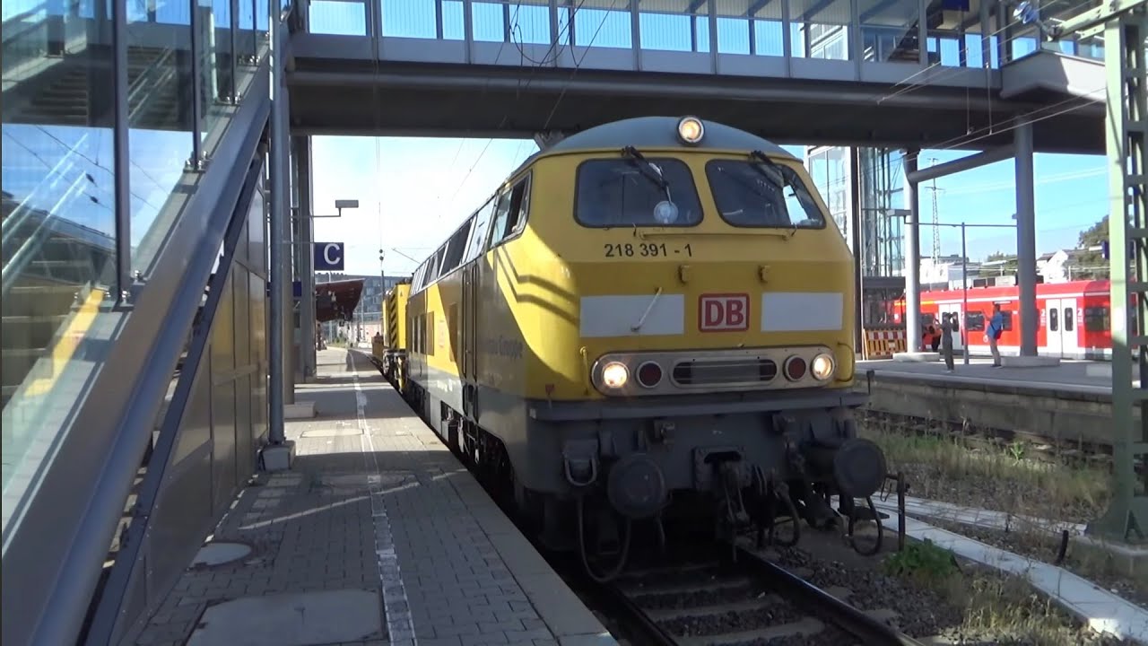 🇩🇪 218 391 (DB) bei der Durchfahrt in Ulm mit einem Kranwagen