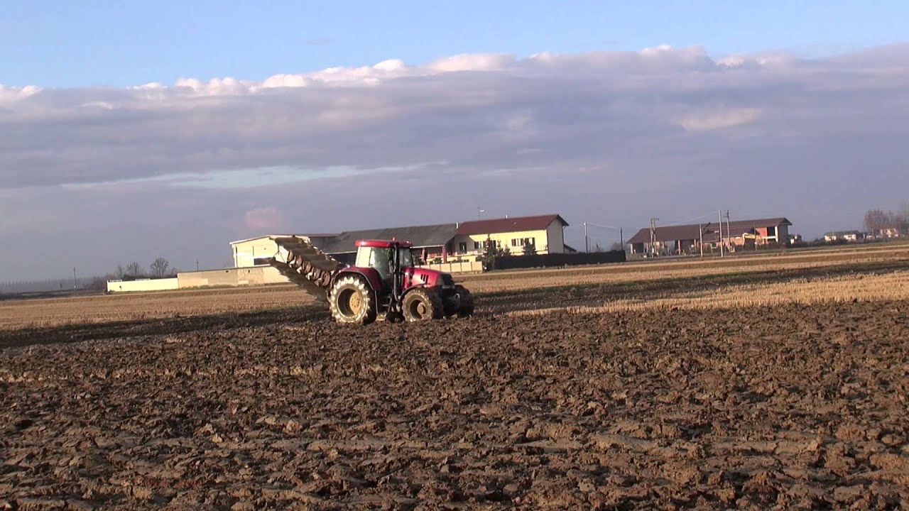 Ploughing in Paddy 2013 - CASE IH 195 CVX + 5 Furrow KUHN Master 100