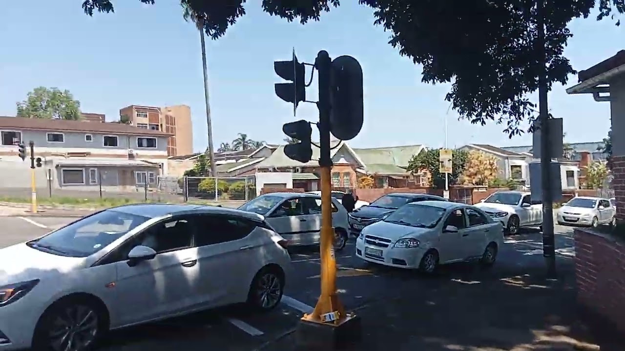 Vid20260207131316? - Bongani walks towards Essenwood Indian market......