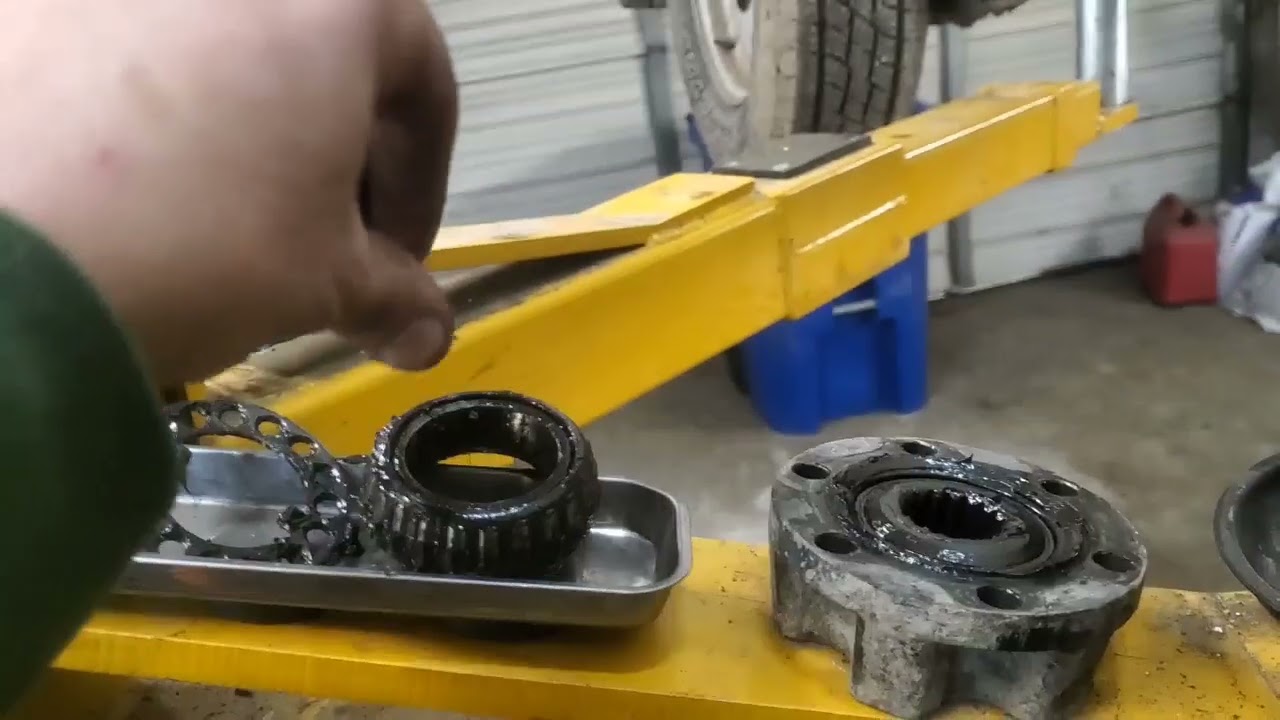 Isuzu Pickup 1992. Front CV Axle Replacement.  Part One.