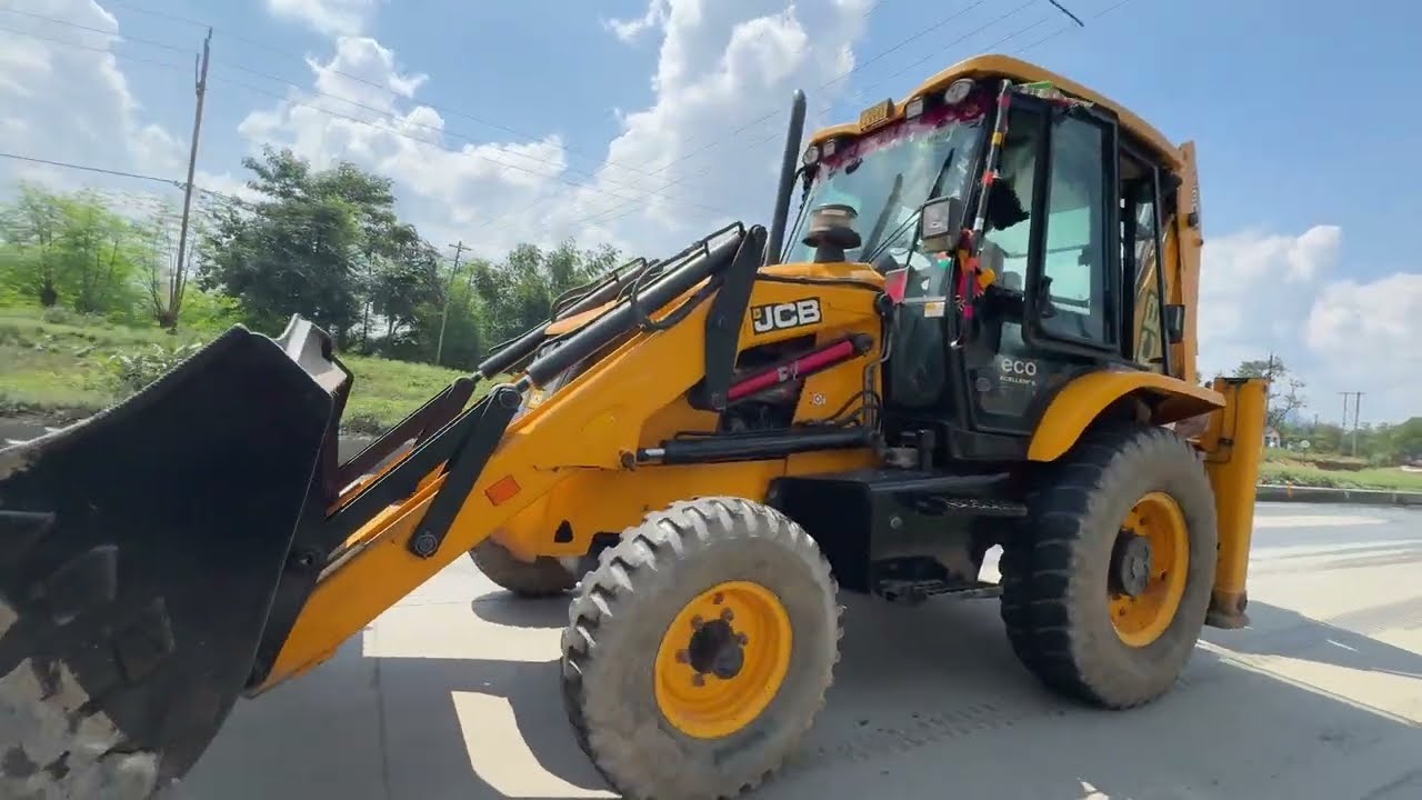 Skilled operator using JCB machine for tough construction work on site