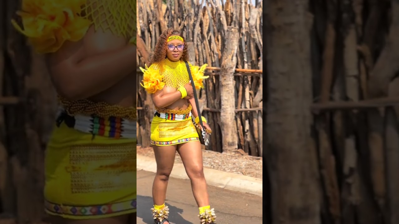 A Young zulu maidens in beautiful culture dress in dance display 