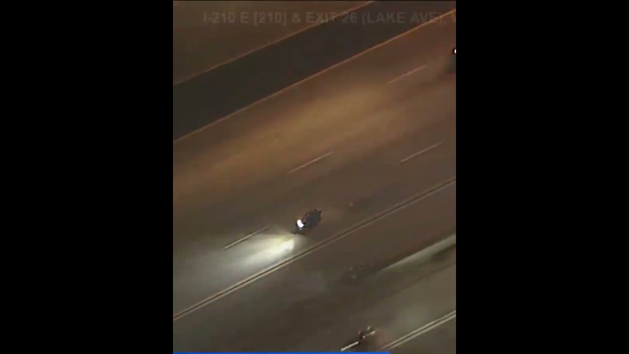 Motorcycle Weaves Through Traffic, Then Vanishes Into Parking Structure #chase #getaway #viral