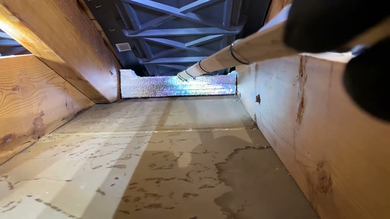 Blocking the soffit under rafter air baffle with foam board and spray foam