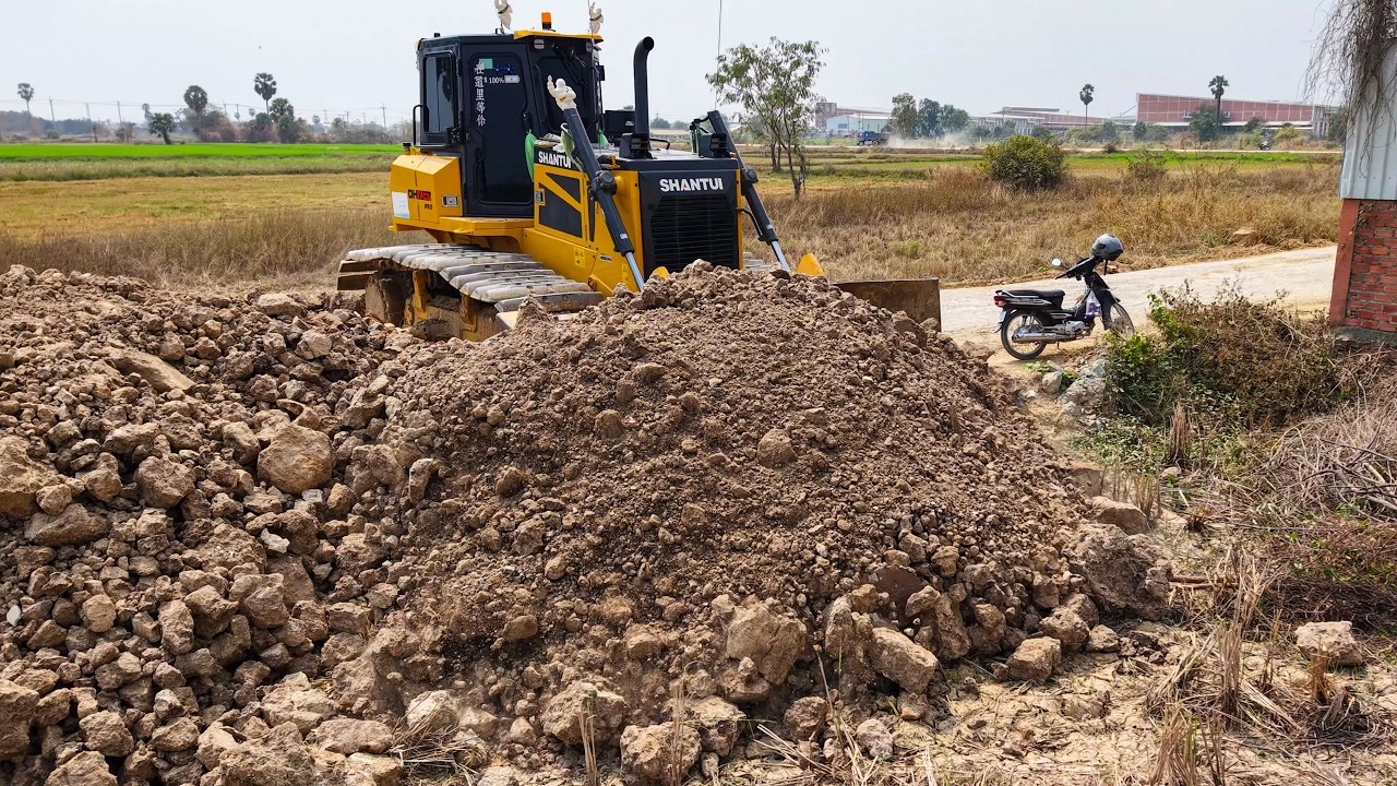 Start New Project! Dump Trucks Pour Soil & Dozers Push Stone Next to the Road