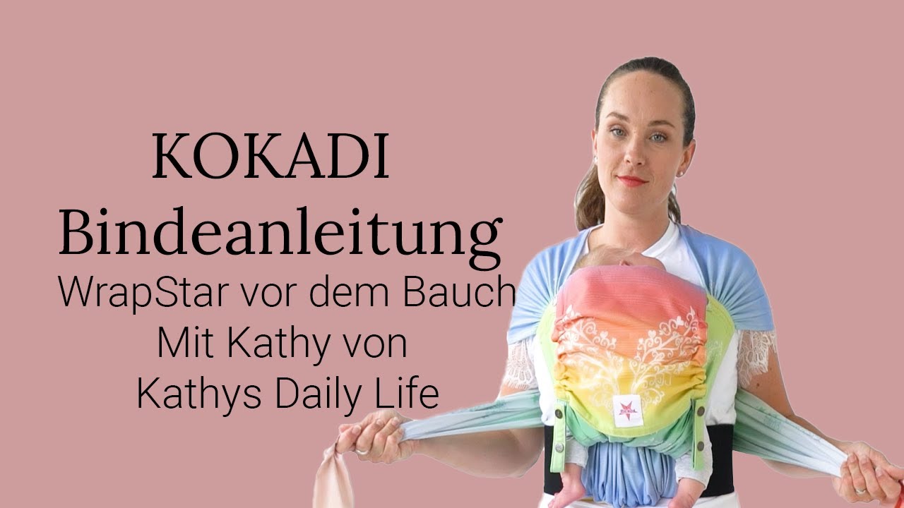 Babytrage Anleitung KOKADI WrapStar vorne auf dem Bauch getragen (Half Buckle / Tragetuchstoff)