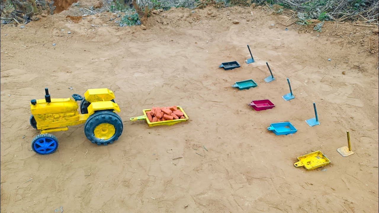The trolley of the big joiner tractor was crushed under the weight of bricks#201