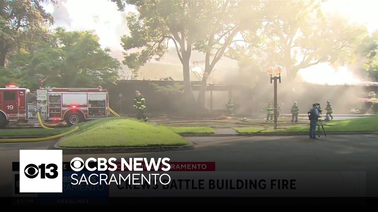 Firefighters work to put out fire in 