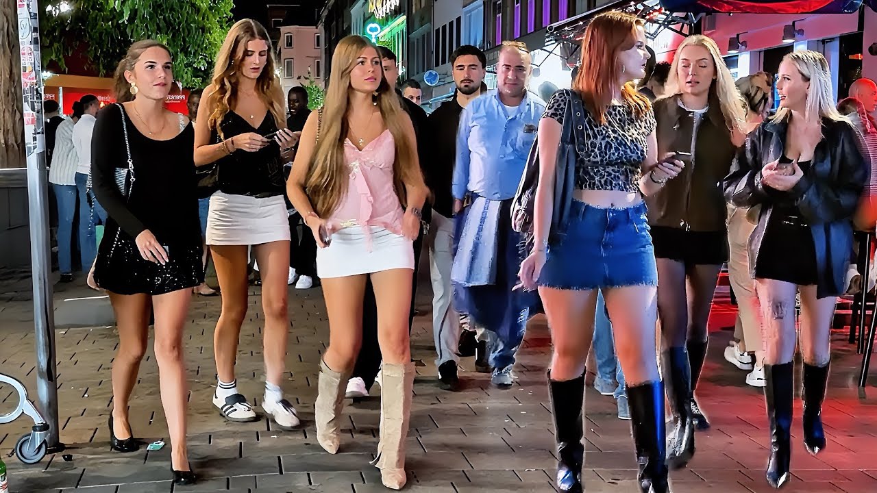 Crazy nightlife in Düsseldorf, Germany, after midnight beautiful single girls partying in 4K