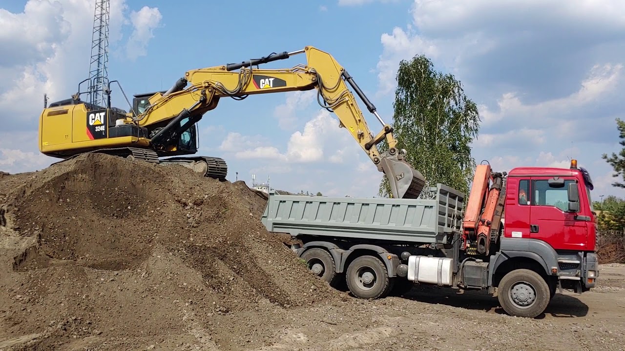 koparka CAT 324 E załadunek Man 6x6
