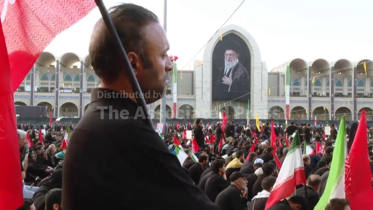 Mourners gather at Tehran's grand mosque for prayer service for slain supreme leader