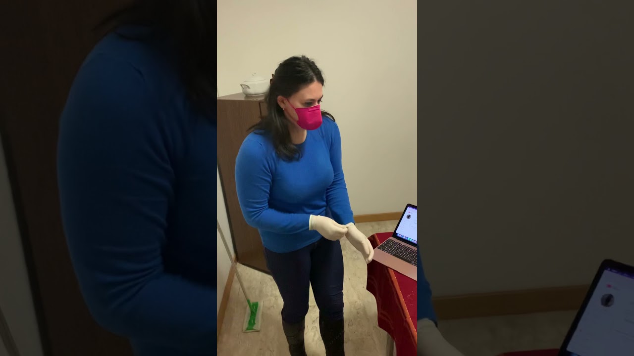 Cleaning the kitchen in tight latex gloves and leather boots