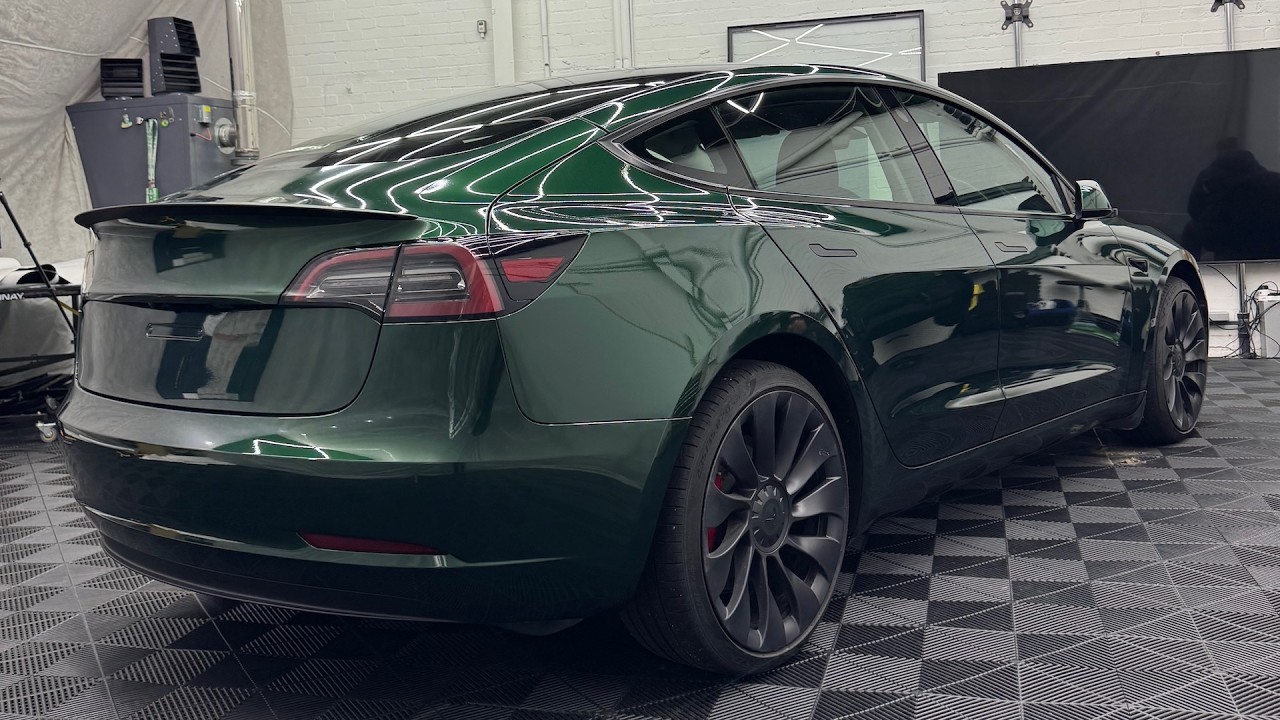 Tesla Model 3 full wrap in APA Spa racing British green vinyl
