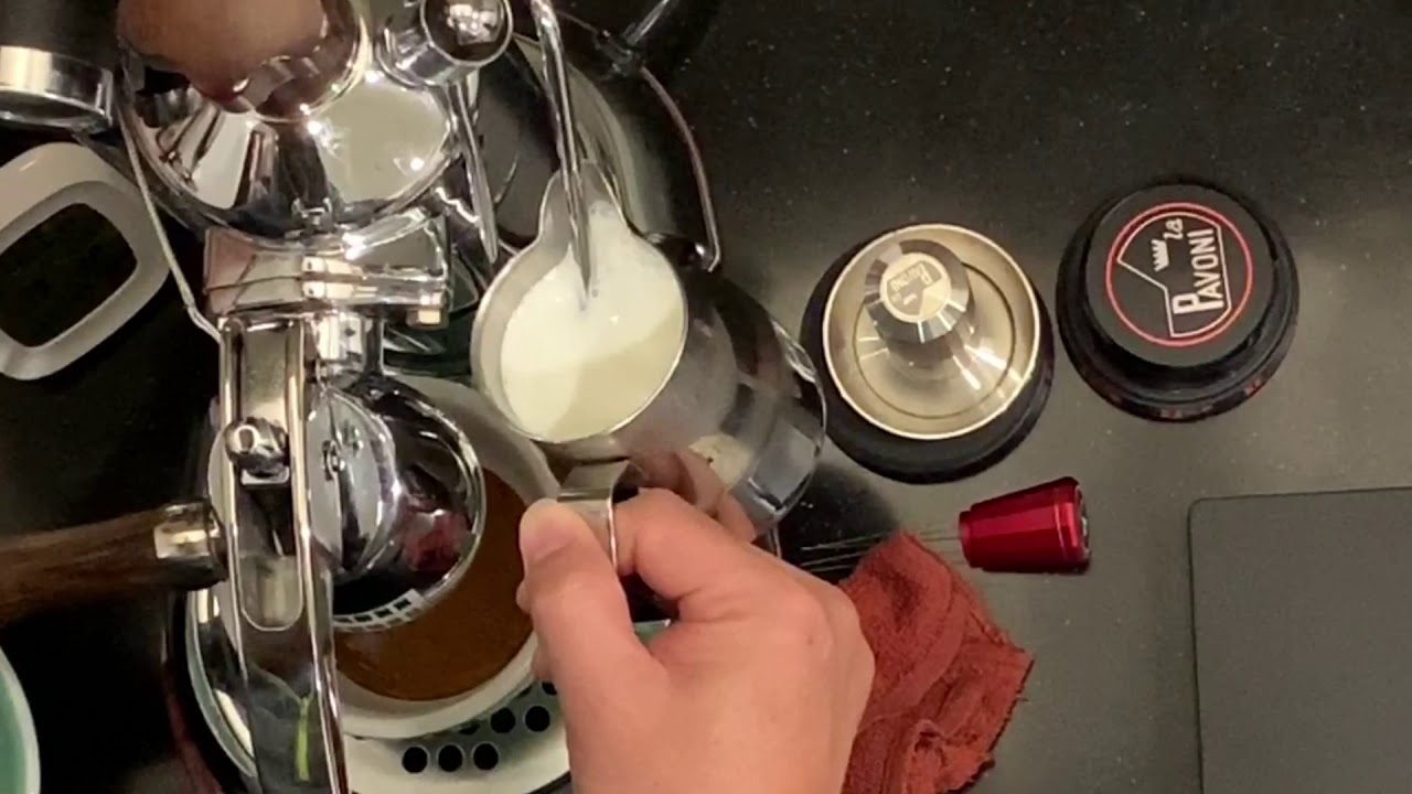 Pour a Coffee latte with La Pavoni Lever machine